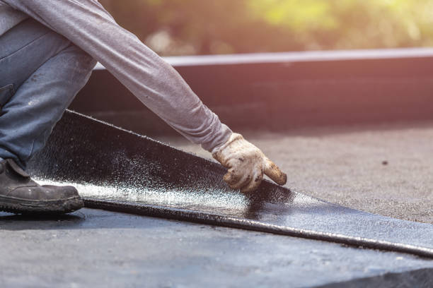 Professional Interior Drainage System technician working in Belford, NJ